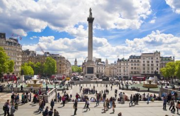 LONDON, UK - MAY 14, 2014: Trafalgar Square with lots of tourist